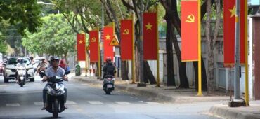 Vibrant Ho Chi Minh City: Vietnam Flags Adorn Streets for Reunification & Labor Day 30/4 - 1/5